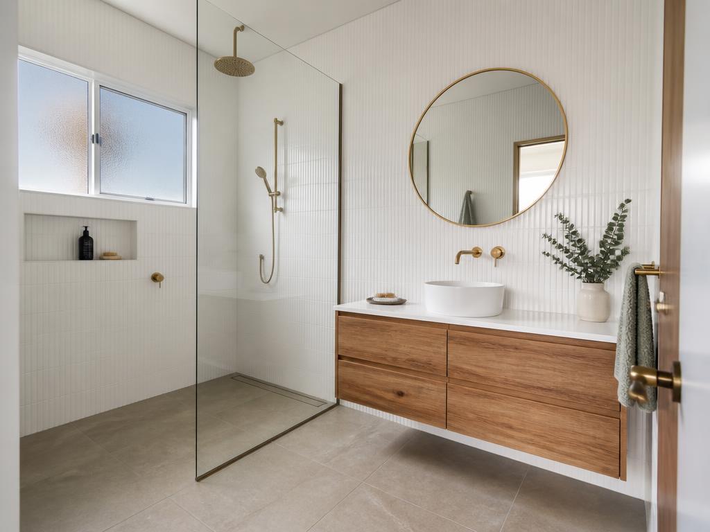 Completed Grand Build Projects bathroom renovation with walk-in shower, brass tapware and timber vanity